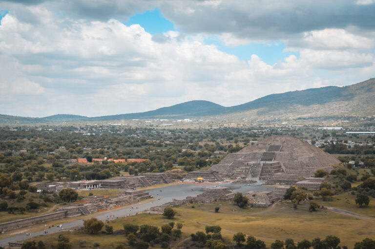 Aerial view of Teotihuacan ruins on a partly cloudy day